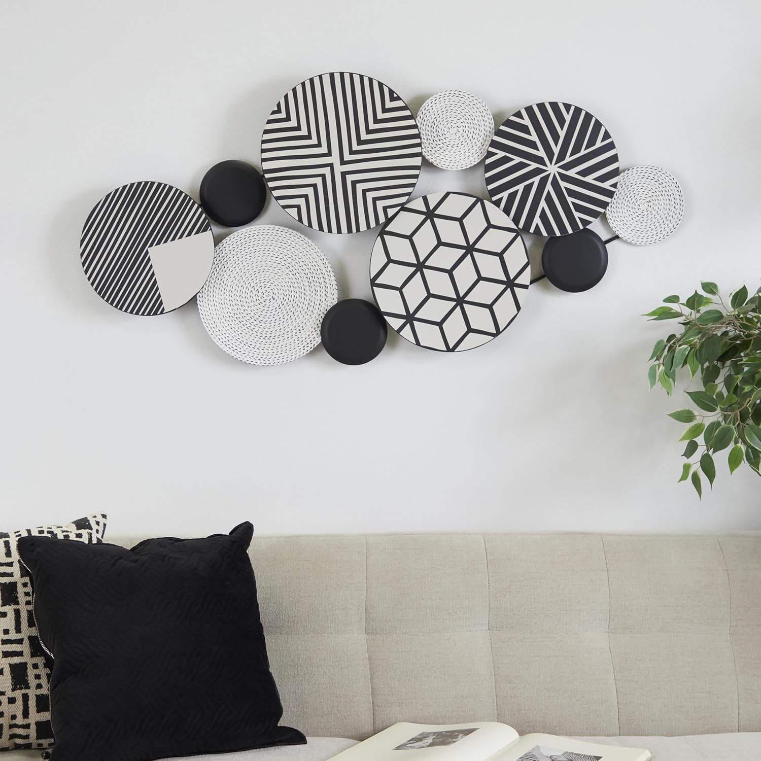 by Cosmopolitan Black Metal Plate Wall Sculpture